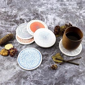 Brand new- Set of 6 colorful ceramic coasters with cork base.